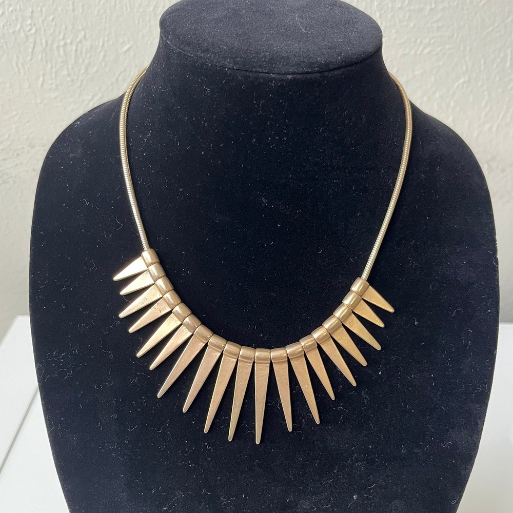 Gold tone spiky sun bib necklace